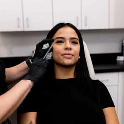 Young woman getting botox